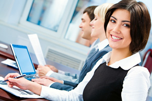 image of a happy employee working in an office